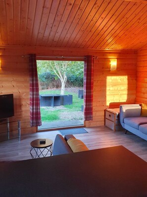 Comfort Cabin, 2 Bedrooms, Garden View | Living area - Chestnut Meadow Country Park (Bexhill-on-Sea)