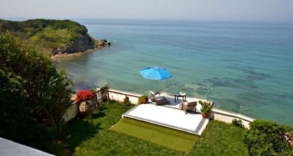 SEASIDE VILLA - HALIKOUNAS with private steps onto the beach
