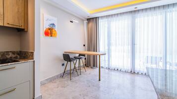 Duplex Swimup Suite | Living area | 39-inch LED TV with satellite channels, TV