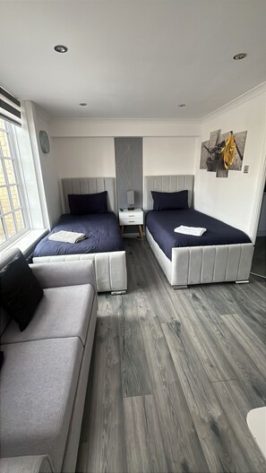 1 bedroom, desk, iron/ironing board, travel cot