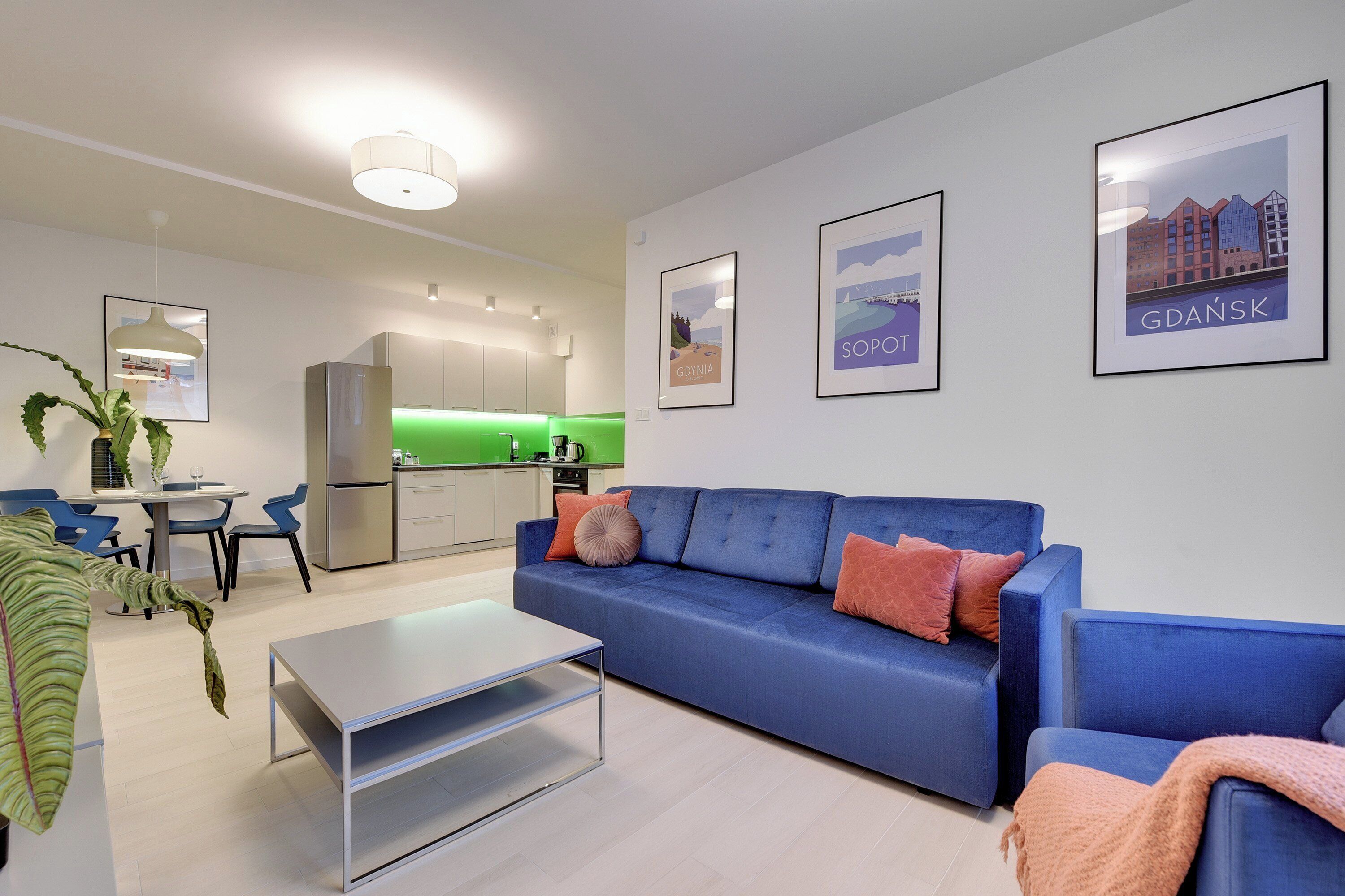 Family Apartment, Balcony, Courtyard View | Living room | Flat-screen TV, heated floors