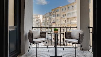 Suite, Balcony | City view