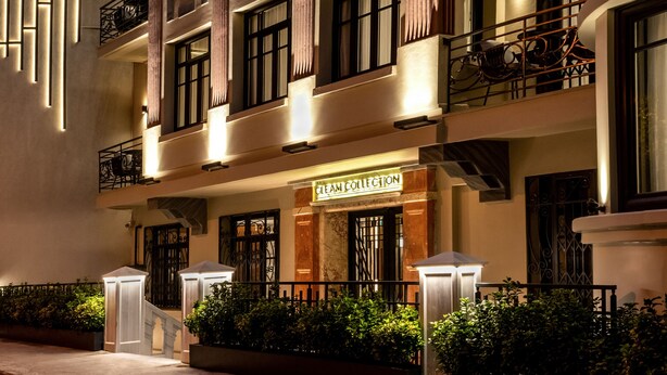 A multi-story hotel with a modern facade, illuminated signage, and a clean, well-maintained exterior. - Gleam Collection Hotel (Istanbul)
