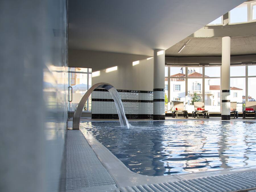 Indoor pool, seasonal outdoor pool, pool umbrellas, sun loungers