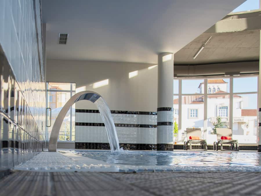 Indoor pool, seasonal outdoor pool, pool umbrellas, sun loungers