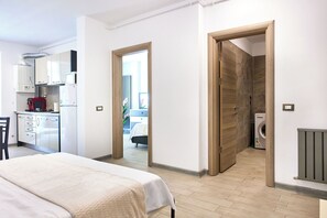 Comfort Apartment | Living area | 140-cm Smart TV with cable channels, TV - Miramare Alezzi (Navodari)