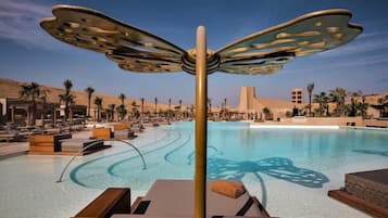 Outdoor pool, open 10:00 AM to 6:30 PM, cabanas (surcharge)