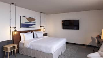 Junior Suite, 1 King Bed with Sofa bed, Balcony, City View | In-room safe, desk, laptop workspace, blackout drapes