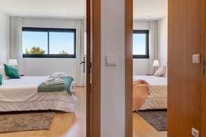 3 عدّة غرف نوم ومكواة/لوح كي وواي فاي مجانًا وملاءات أسرّة