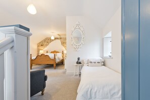 1 bedroom, desk, iron/ironing board, travel crib