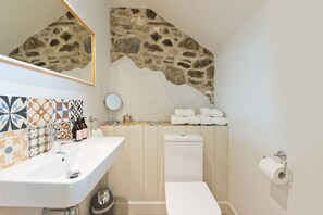 Shower, eco-friendly toiletries, hair dryer, towels