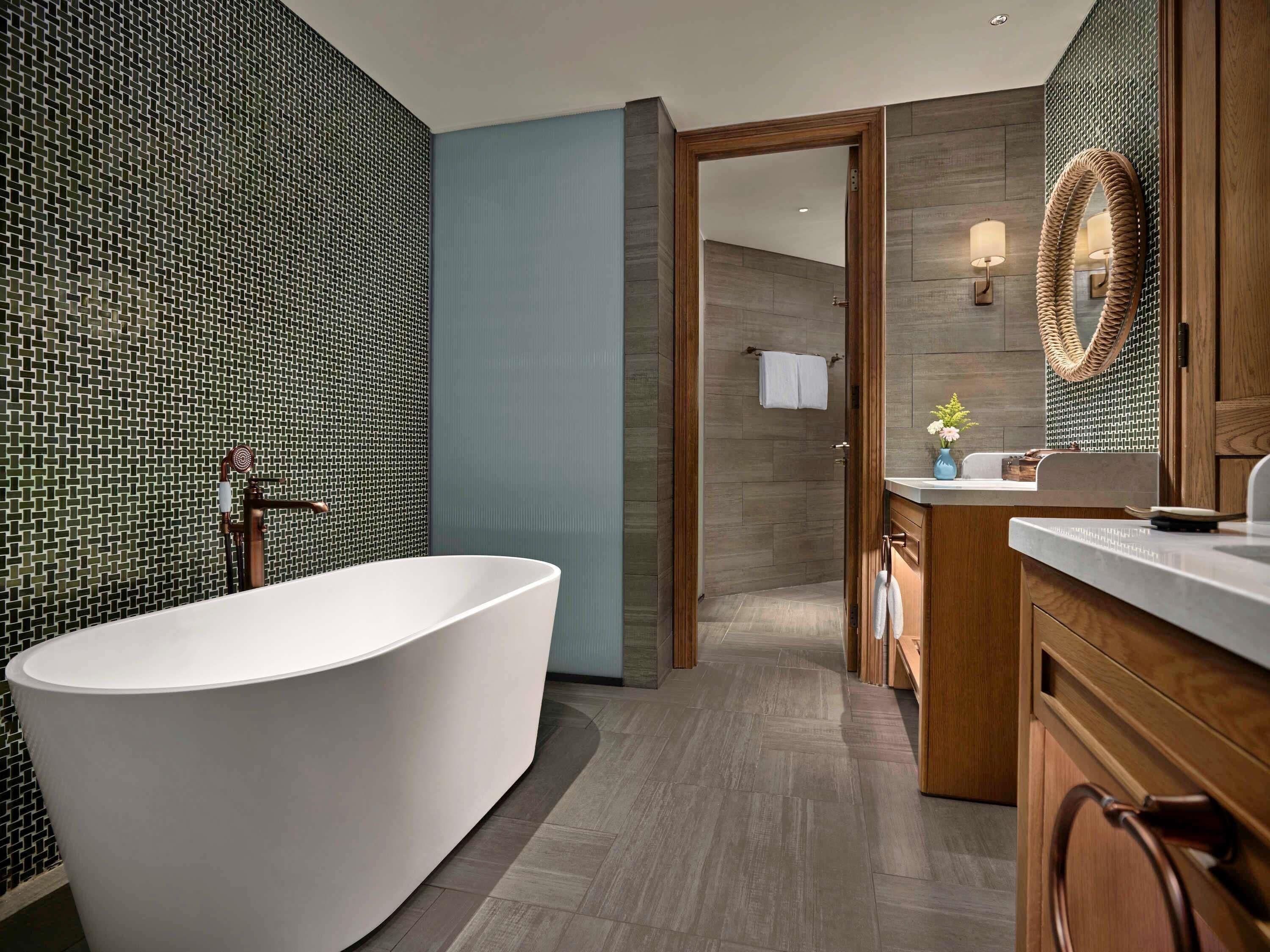 Suite, 1 King Bed, Sea View | Minibar, in-room safe, soundproofing, iron/ironing board