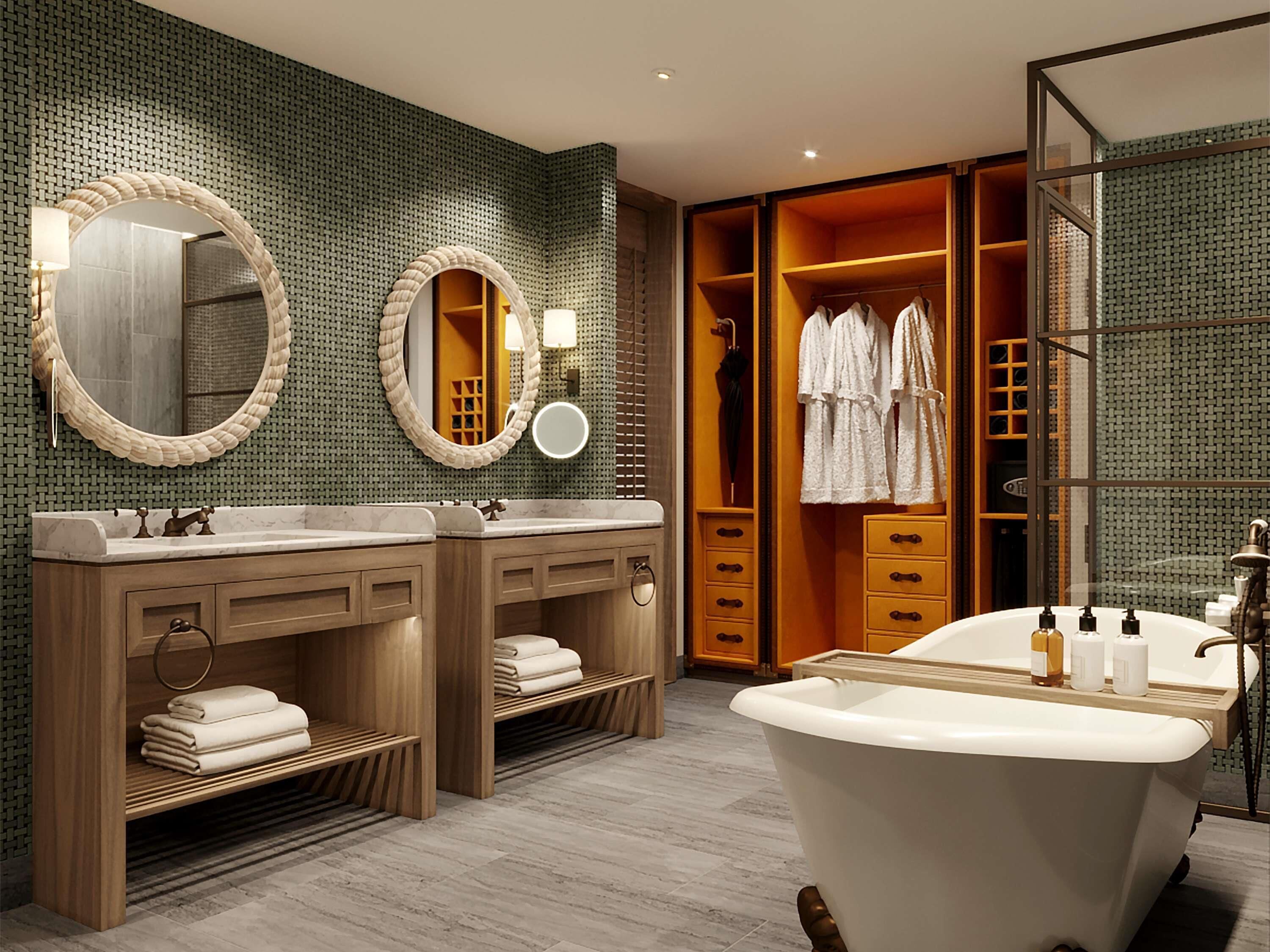 A modern bathroom with a freestanding bathtub, double vanity with a mirror, wooden storage cabinets, and a walk-in closet with hanging robes.