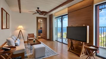 Suite, 1 King Bed, Sea View | Living area | 50-inch TV with digital channels