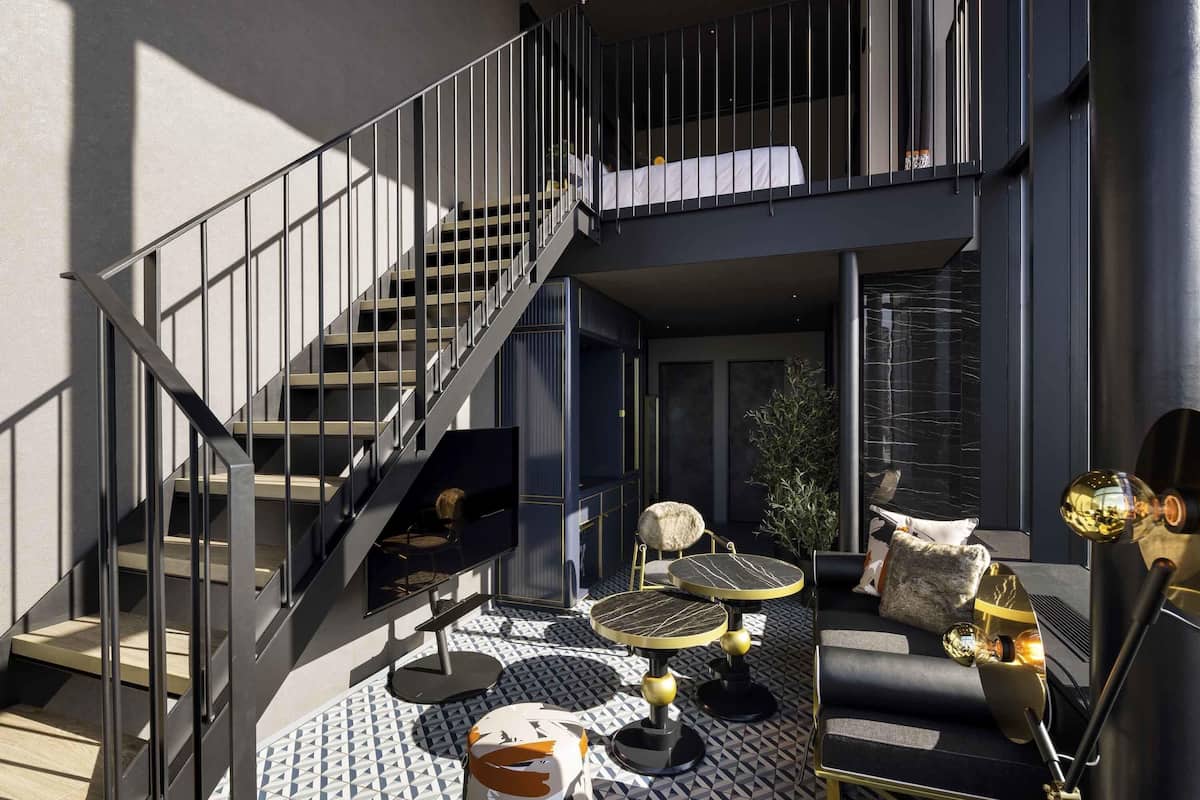 Suite, 2 camas individuales | Caja de seguridad en la habitación, escritorio y cortinas blackout