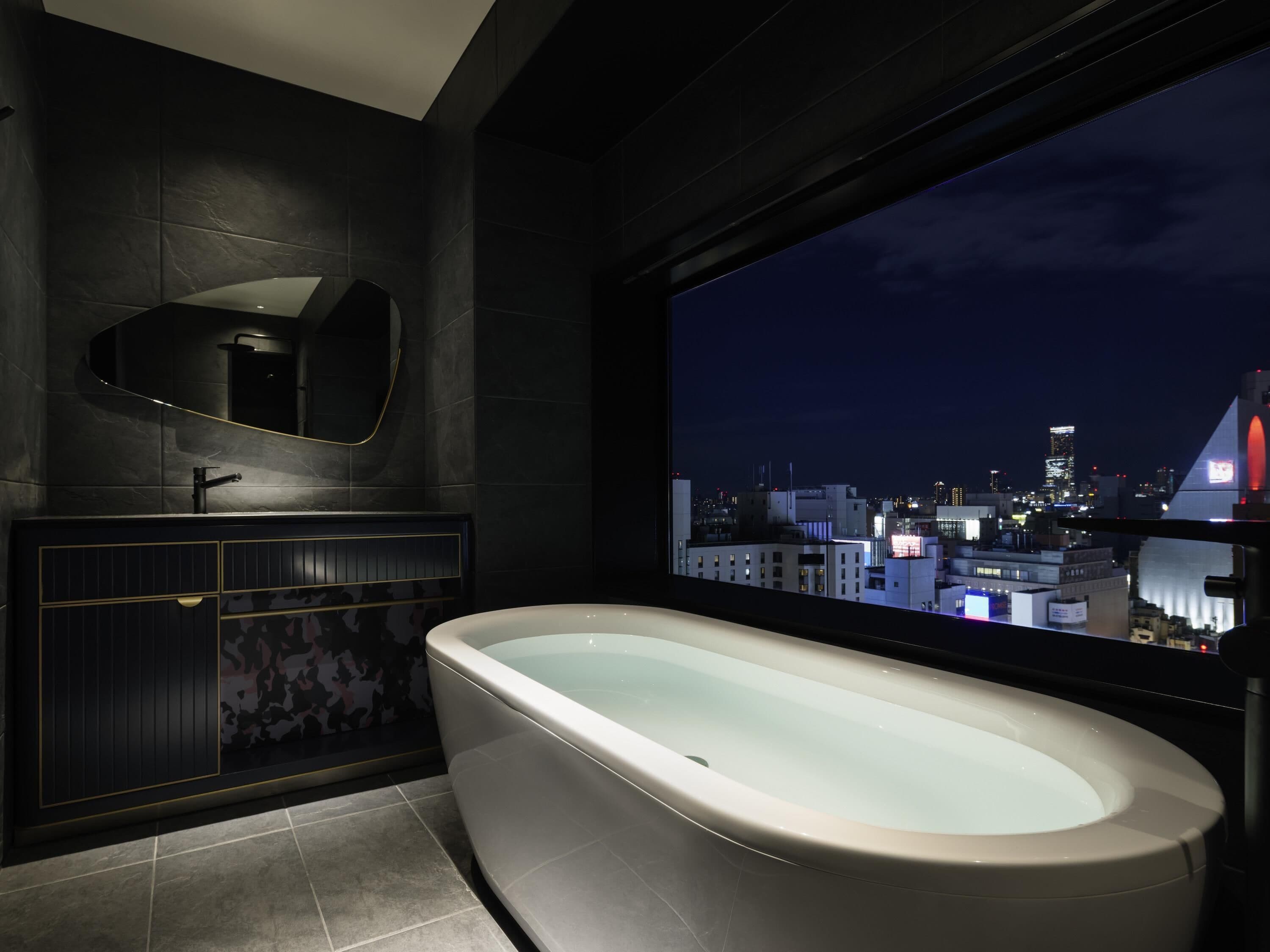 Suite, 2 Single Beds | Bathroom | Hair dryer, slippers, bidet, towels