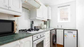 Apartment | Private kitchen | Fridge, microwave, oven, stovetop