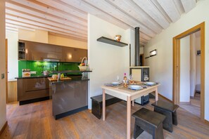Family Apartment, Multiple Bedrooms, 2 Bathrooms (Alpino Ski in-Ski out 10m) | Dining