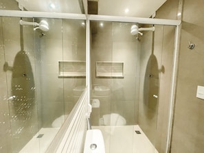 Shower, towels, soap, toilet paper