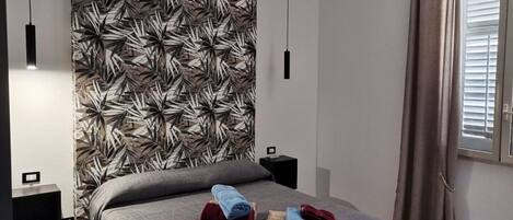 1 slaapkamer, een bureau, een strijkplank/strijkijzer, gratis wifi