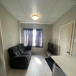 Deluxe suite | Woonruimte | Ledtelevisie