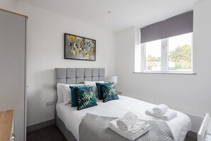 1 slaapkamer, een strijkplank/strijkijzer, wifi, beddengoed