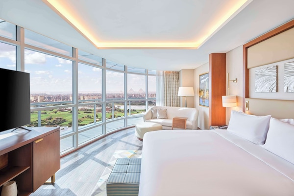 Premium bedding, memory-foam beds, minibar, in-room safe