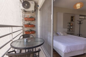 Apartamento design, 1 cama King | Terraço/pátio