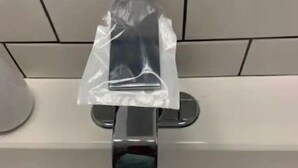 A bathroom sink with a faucet, a drain, and a plastic bag hanging on the faucet. - NEAR TX A&M, HWY 6 , NO CLEANING FEE ,ENTIRE PLaCE (College Station)