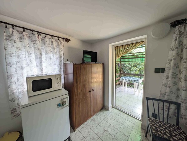 Interior - Studio with garden furniture near Lake Balaton (Balatonfenyves)