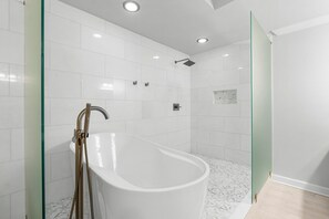 Combined shower/tub, hair dryer, towels, toilet paper