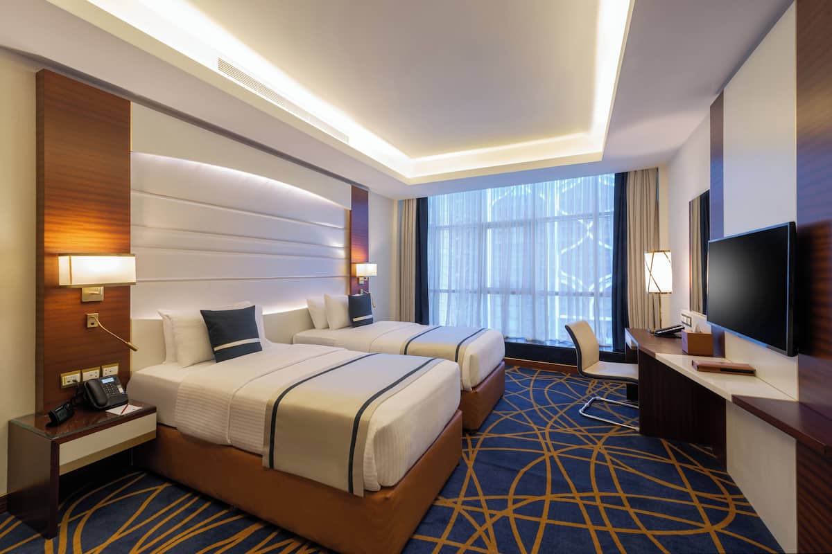 Premium bedding, down duvets, Select Comfort beds, in-room safe