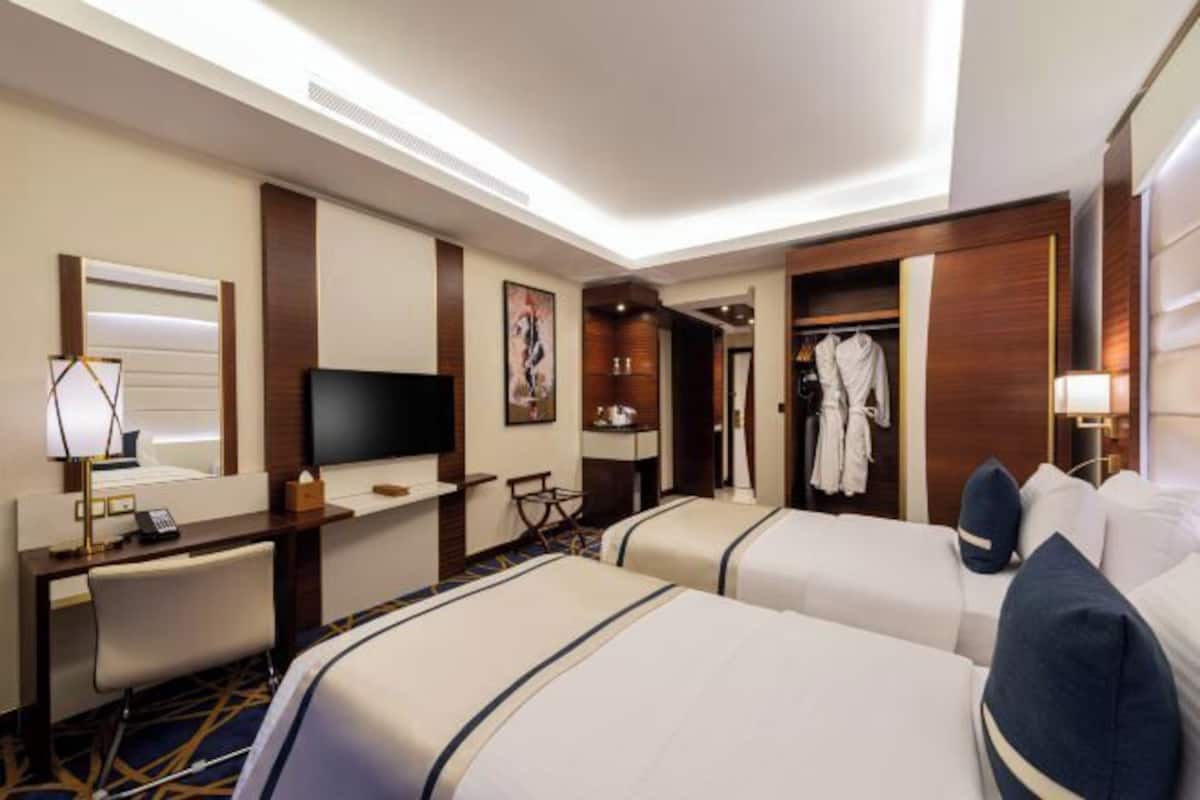 Premium bedding, down comforters, Select Comfort beds, in-room safe