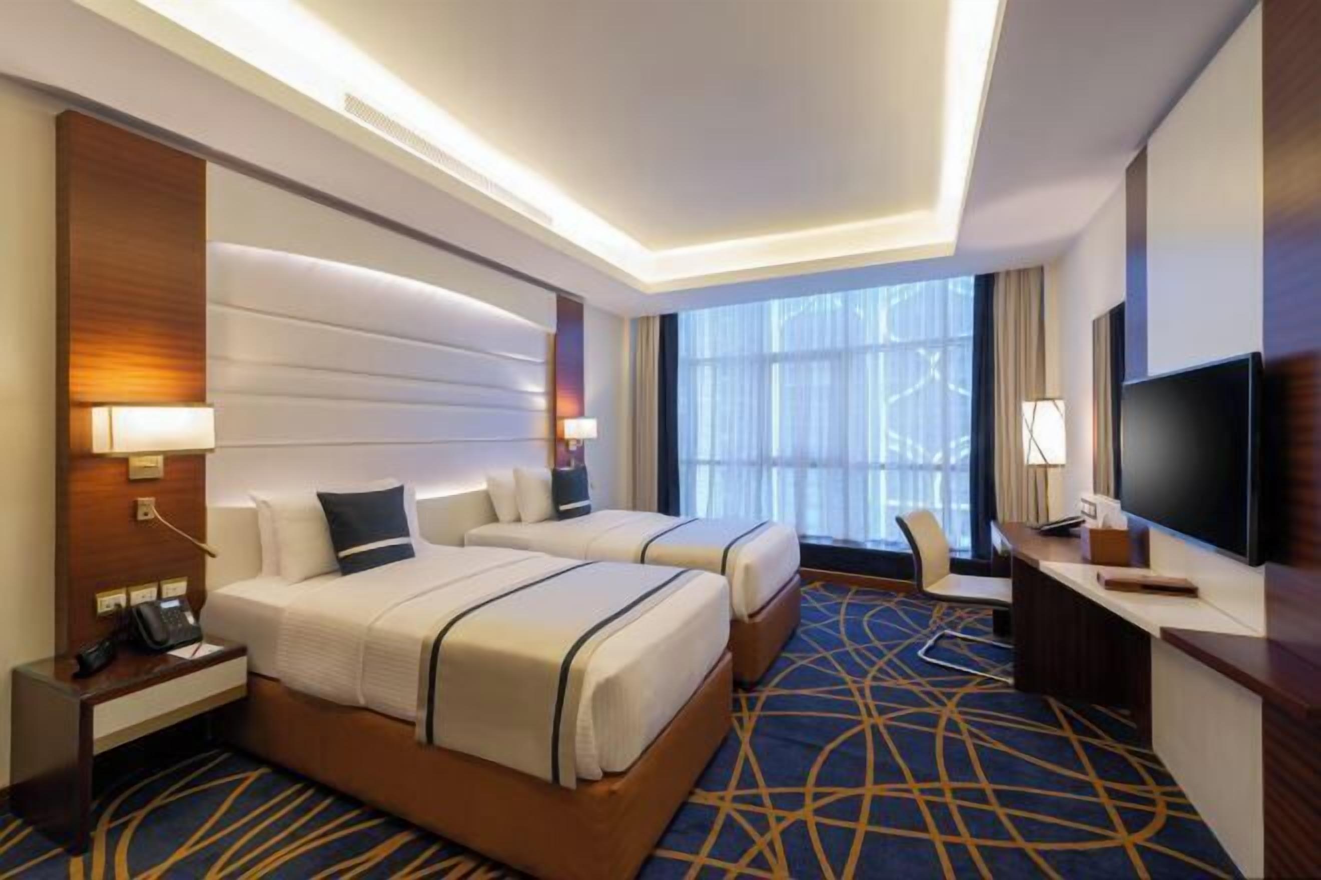 Premium bedding, down duvets, Select Comfort beds, in-room safe