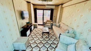 Apartemen Kota | Area keluarga | Televisi plasma 40-inci dengan saluran TV satelit dan TV