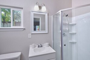 Shower, hair dryer, towels, soap