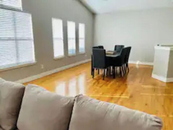 Enjoy meals in the dining area with a table and chairs.