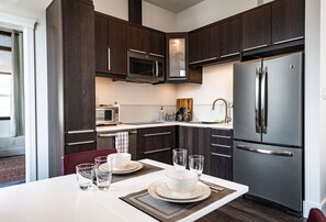 Condo | Private kitchen | Full-size fridge, microwave, stovetop, dishwasher