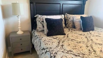 1 bedroom, desk, iron/ironing board, travel crib