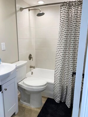 Combined shower/tub, hair dryer, towels, soap - Capital City Condo #4 (Frankfort)