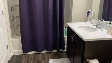 Combined shower/tub