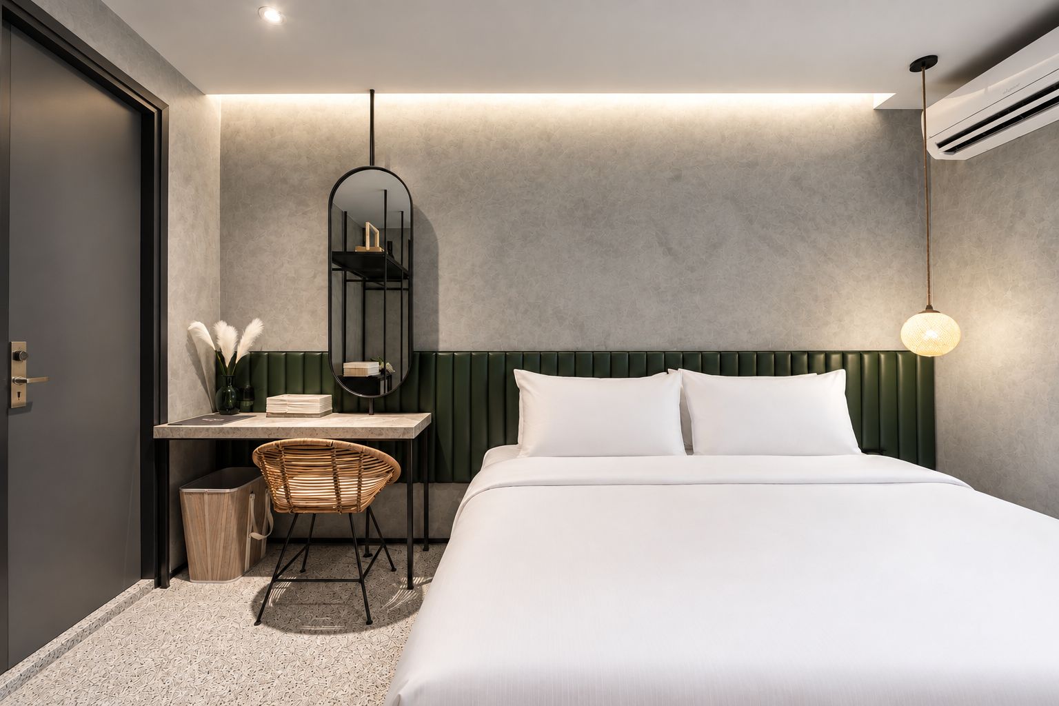 Une chambre moderne comprenant un lit, un bureau, une chaise et un luminaire suspendu.