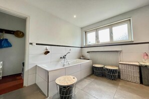 Bathtub, hair dryer