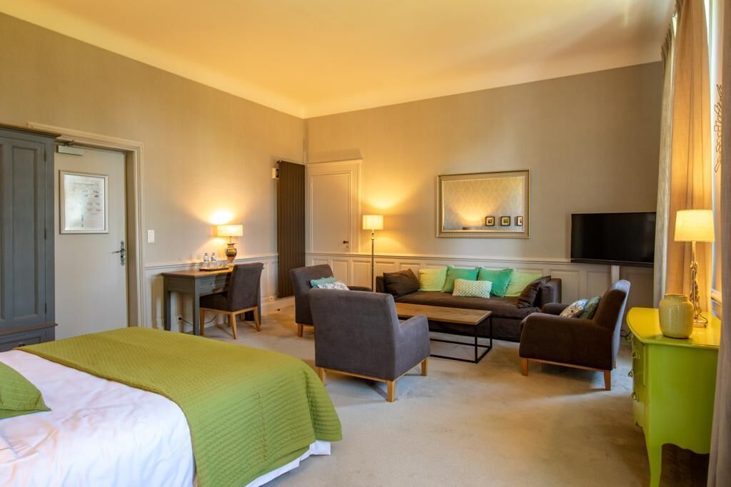 Chambre Triple Deluxe, vue jardin | Literie de qualité supérieure, coffres-forts dans les chambres