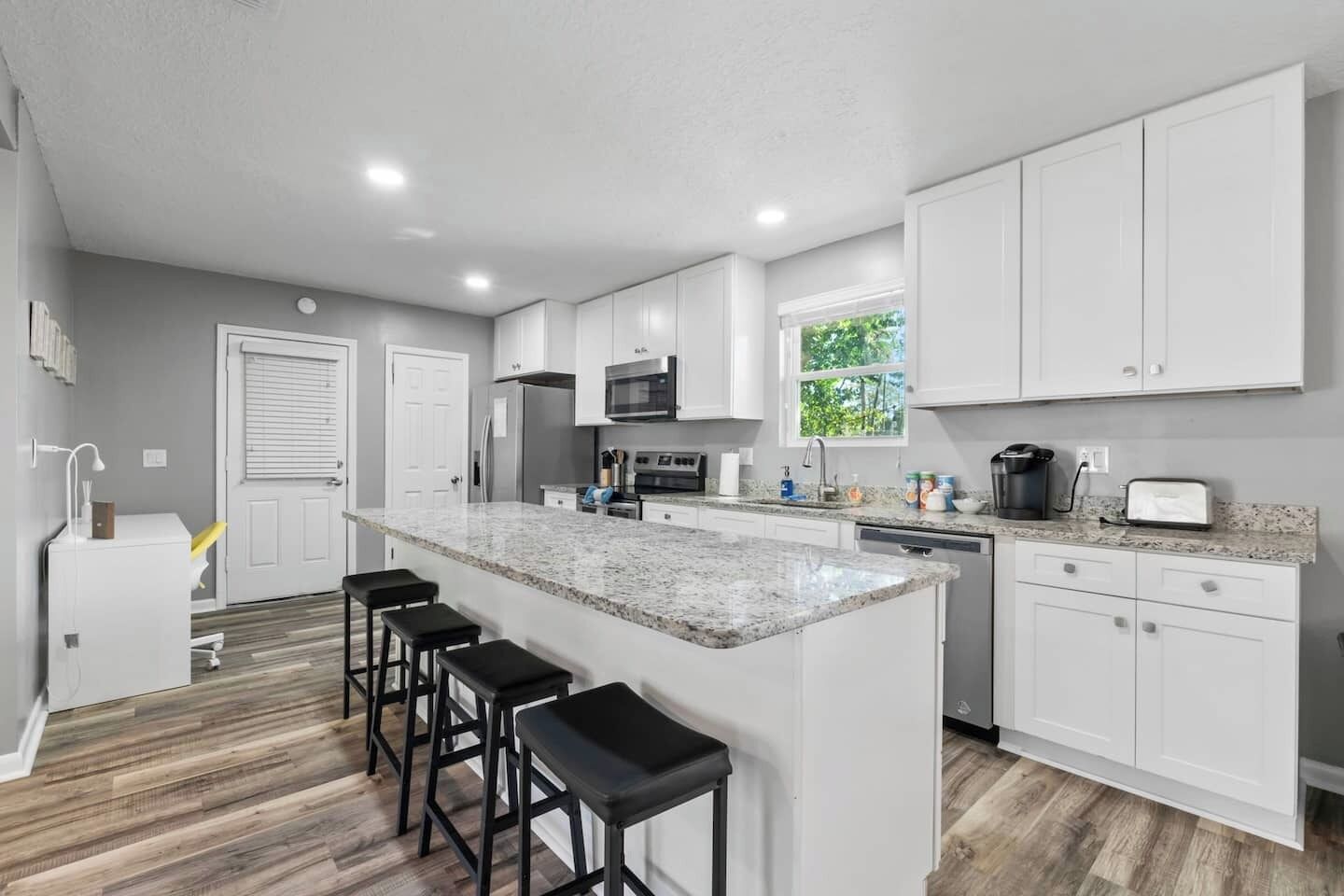 Fridge, coffee/tea maker, toaster, dining tables