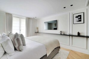 2 habitaciones, tabla de planchar con plancha, cuna de viaje y wifi 