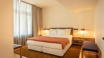 Suite familiar | Camas Select Comfort, minibar y caja de seguridad en la habitación