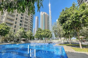 Outdoor pool, pool umbrellas, pool loungers