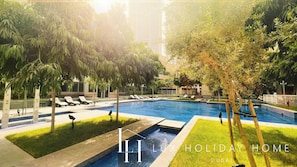 Outdoor pool, pool umbrellas, pool loungers