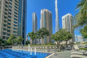 Outdoor pool, pool umbrellas, pool loungers